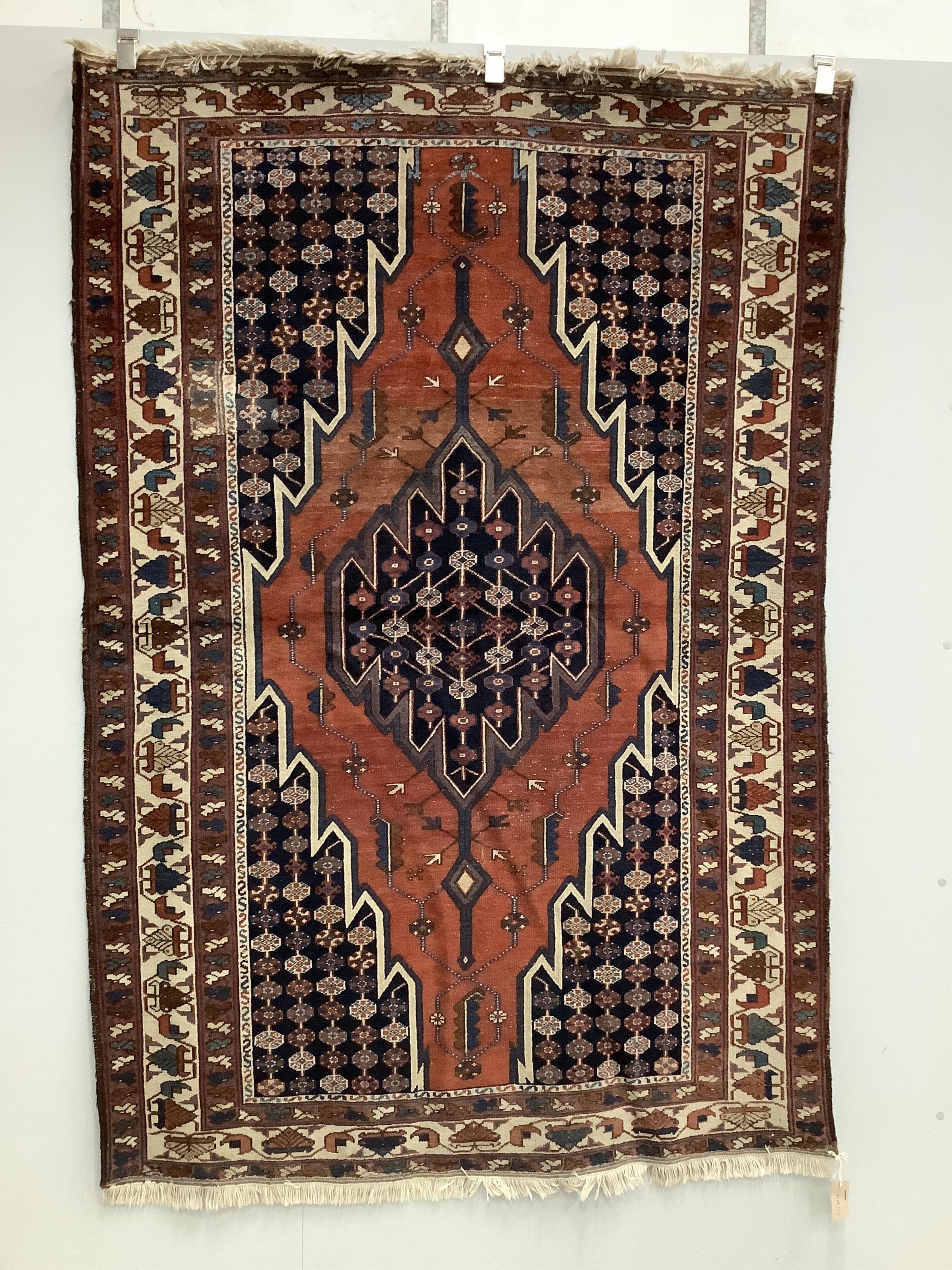 A Mazleghan blue ground rug, 194 x 136cm. Condition - fair but has a patch repair